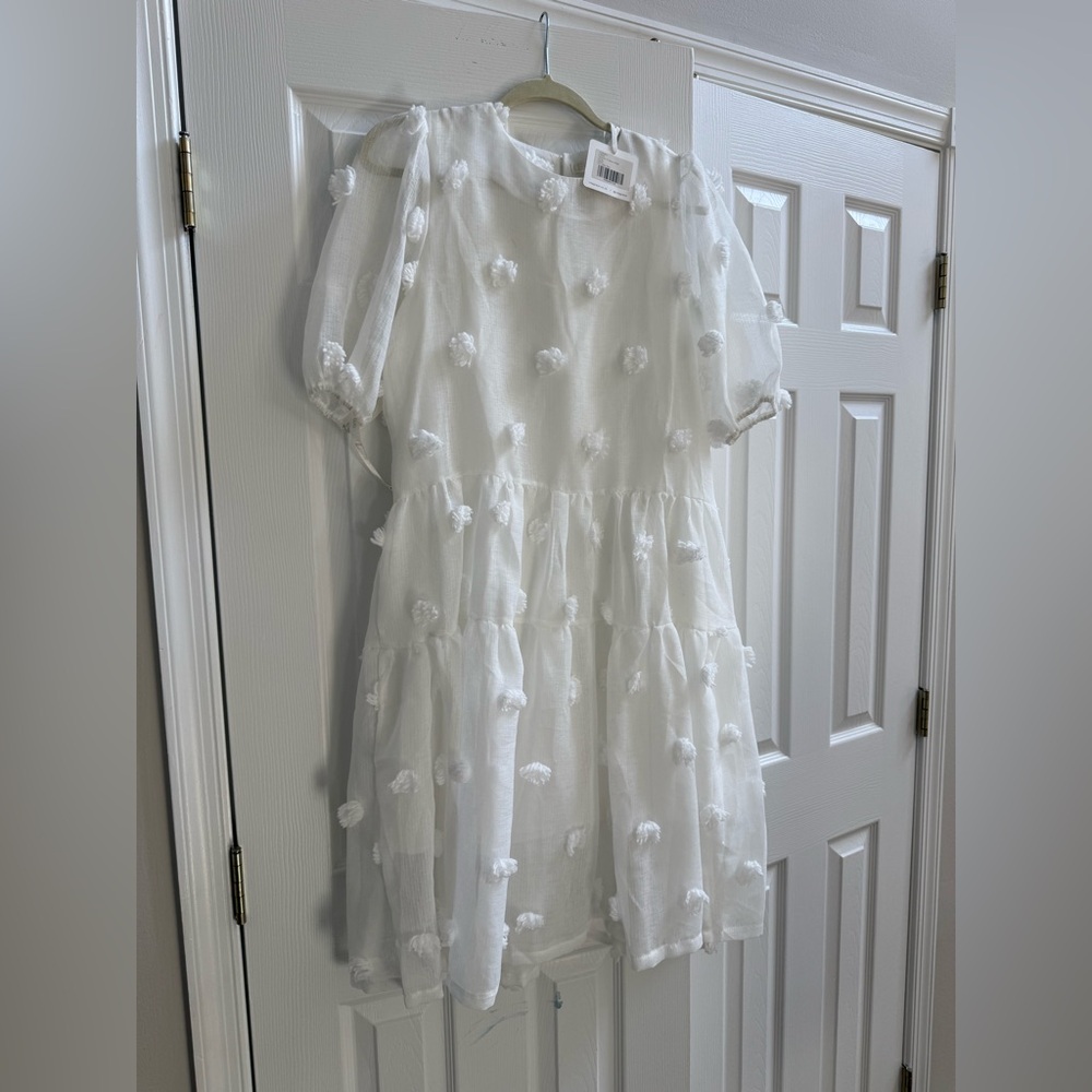 Elegant White Midi Dress with Textured Accents